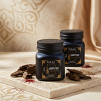 FIZLAJ Oud Zaffron Duo with two 140gm bakhoor containers displayed in a warm Arabic-style living room